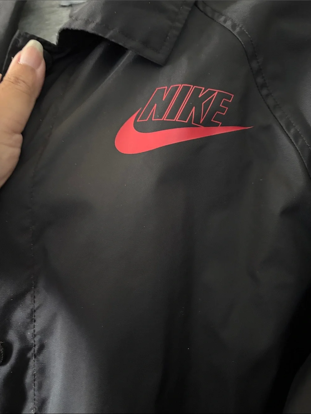Nike Black Lightweight Coach Jacket with Red Logo